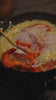 Shrimp and noodles simmering in the YS012 pan; no audio