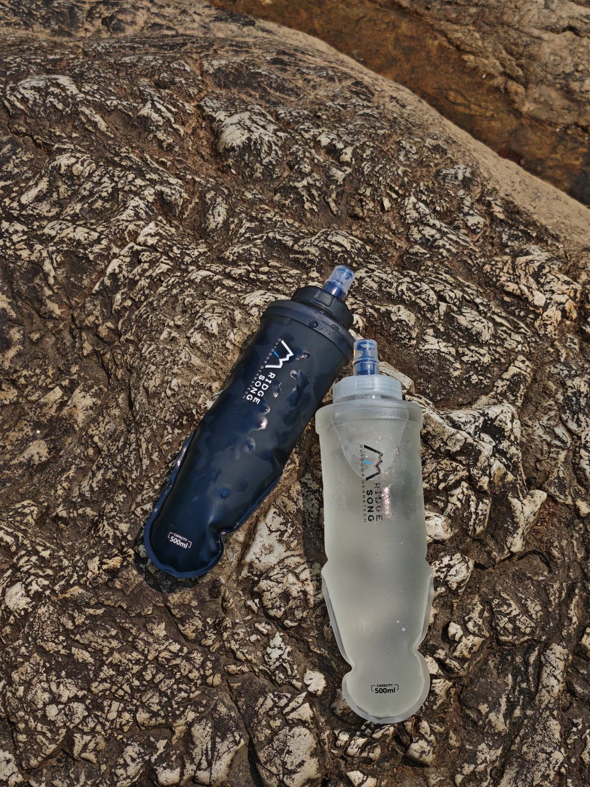 Olive Black and Mist White soft flasks outdoors
