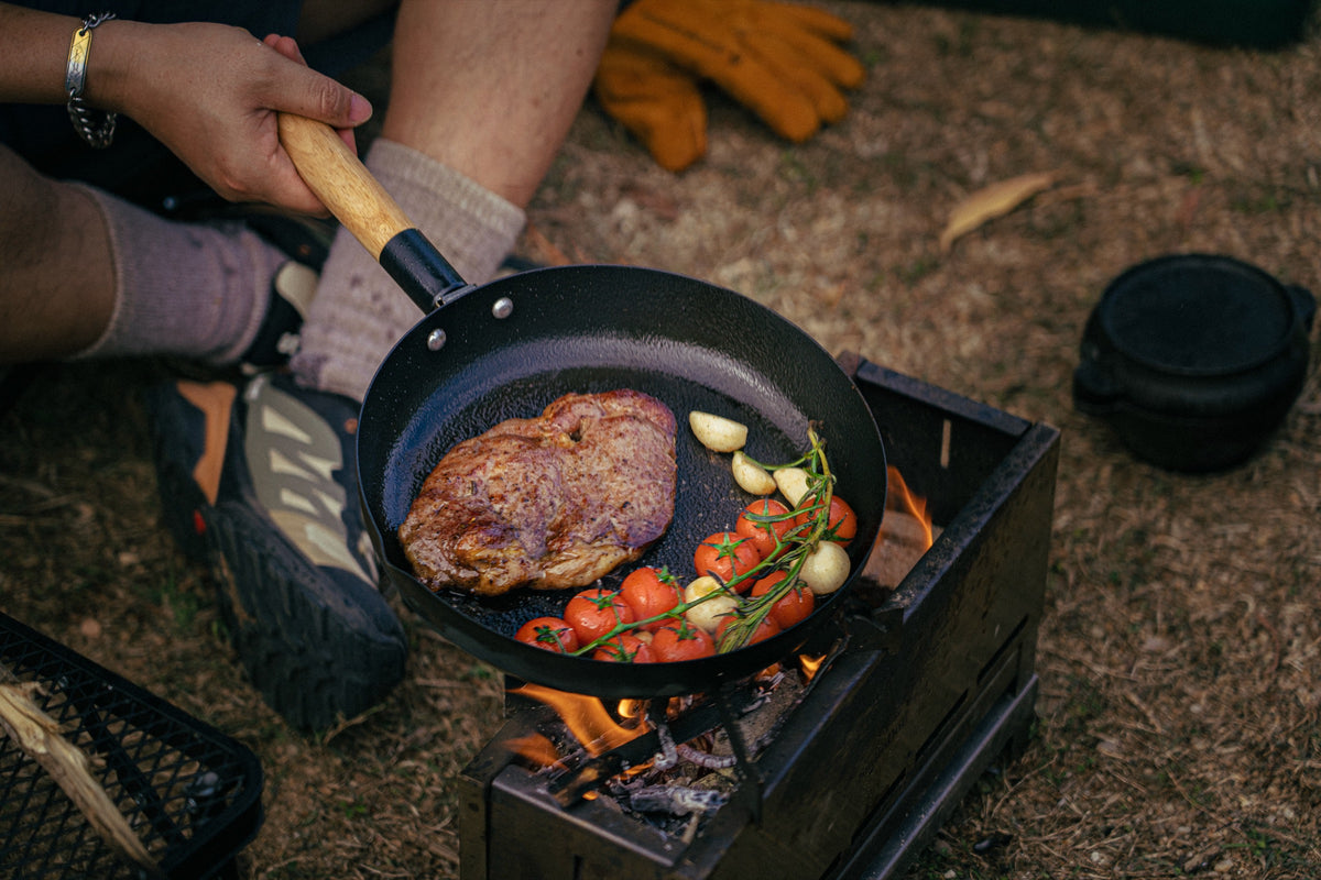 Outdoor cooking with the RidgeSong iron frying pan