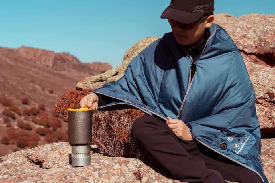 RidgeSong Hammered Tea and Coffee Fusion Titanium Trekking Pot seated on the Blaze alcohol stove